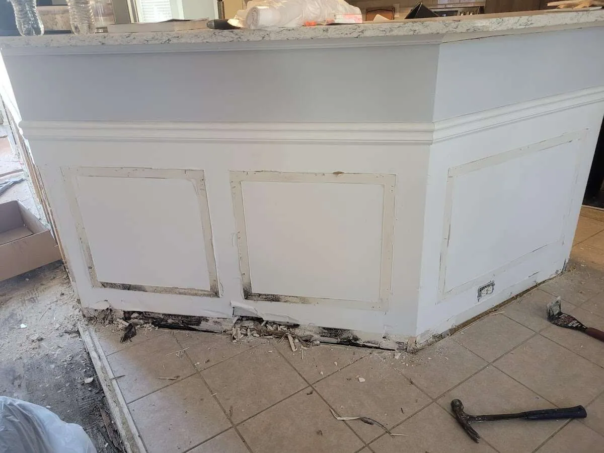 Water damage and mold on kitchen during Sewage Cleanup & Sanitation in Fort Myers Shores